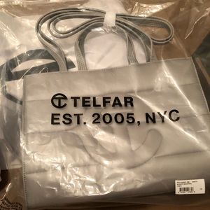 Telfar medium silver puffer tote.